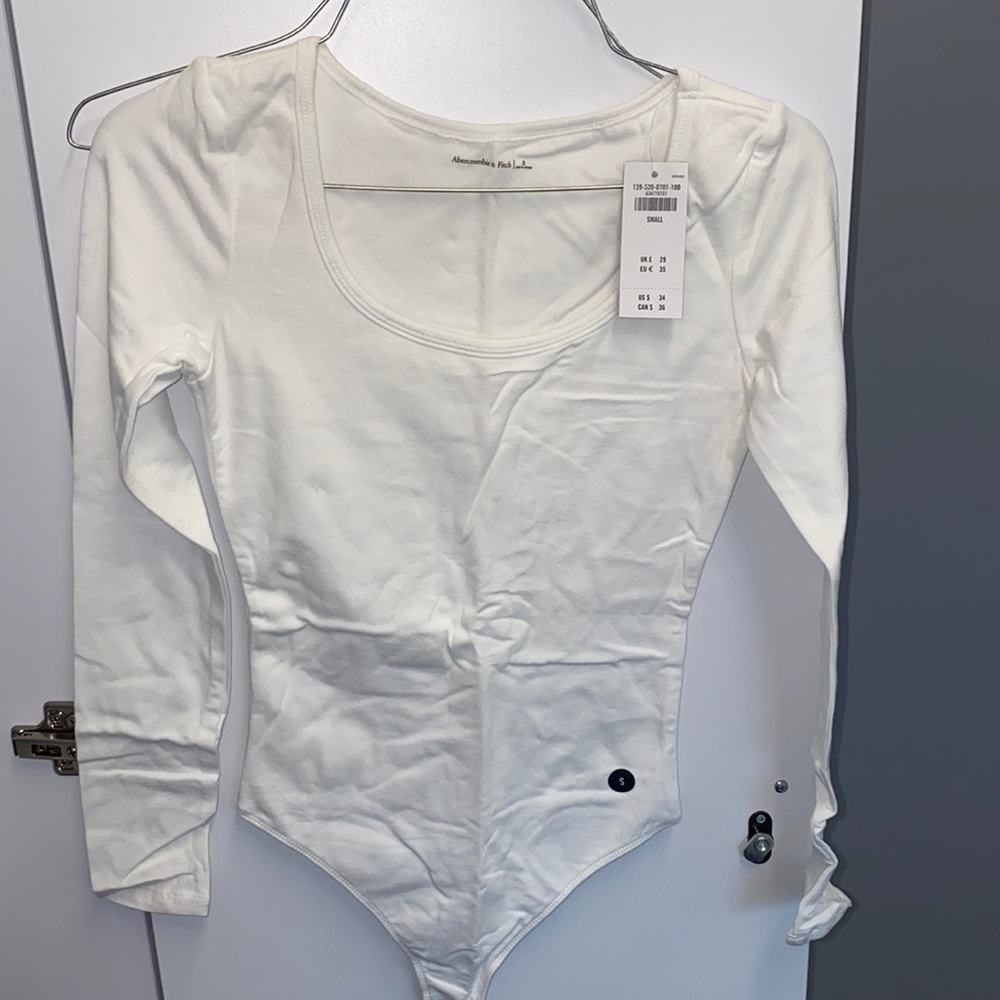 White cotton long sleeve body suit